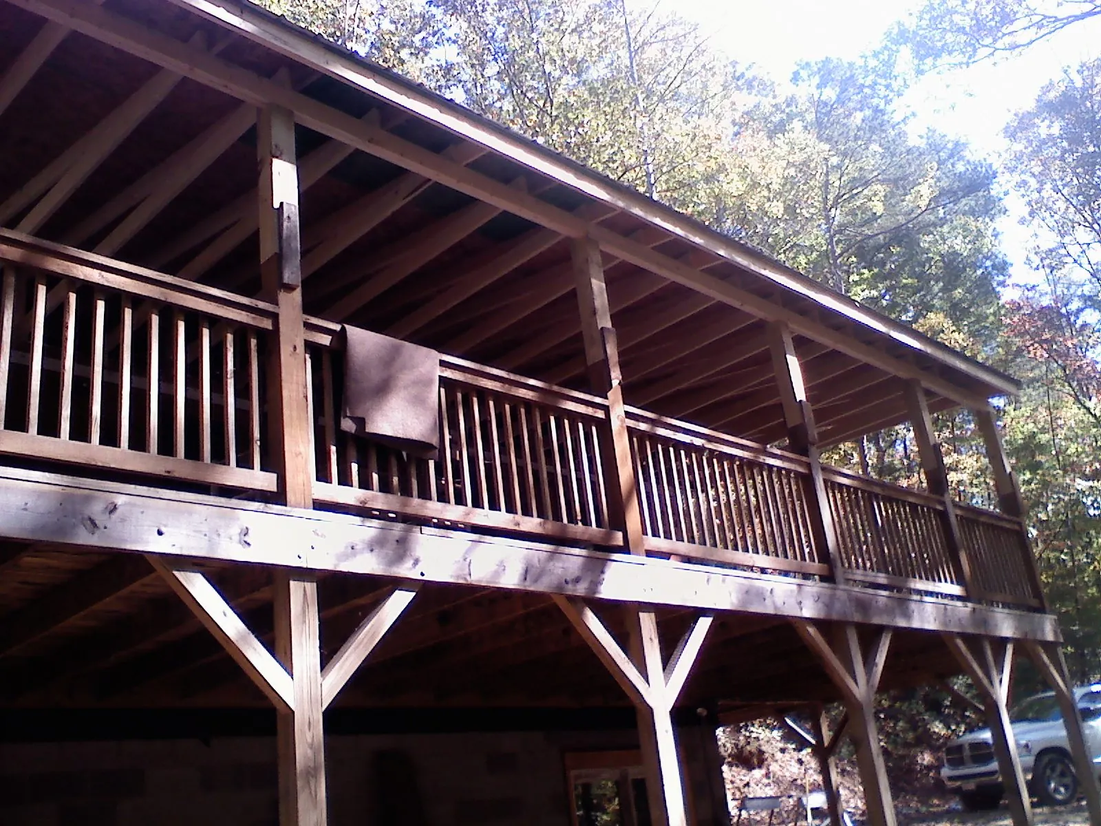 Timber framing under a new elevated porch and deck — Roof Leak Repair in Mattituck by Roofing Brothers
